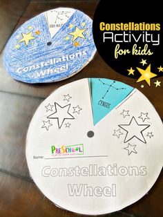 two paper plates with stars on them and the words constellations wheel written in white