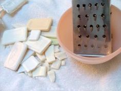 a grater and some pieces of white chocolate