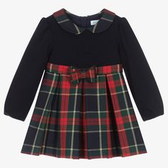 Dress your little one in this timeless navy blue and red tartan dress by Abel & Lula crafted from a soft and stretchy viscose-blend jersey. Stylishly designed with a classic Peter Pan collar and gentle twill skirt, this gently flowing dress is lined with the softest cotton voile for superior comfort. Accentuated by a removable bow, this timeless piece is an elegant and exclusive addition to any little girl's wardrobe. Red Tartan Dress, Twill Skirt, Designer Dresses For Kids, Green Tartan, Spanish Fashion, Flowing Dresses, Tartan Dress, Designer Kids Clothes, Red Tartan