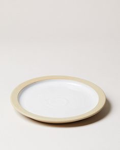 a white plate sitting on top of a table