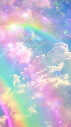 a rainbow colored sky with clouds and stars