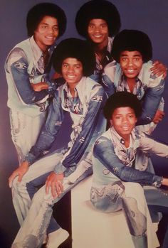 the jacksons are posing for a group photo