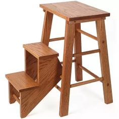 a wooden step stool with steps up to it