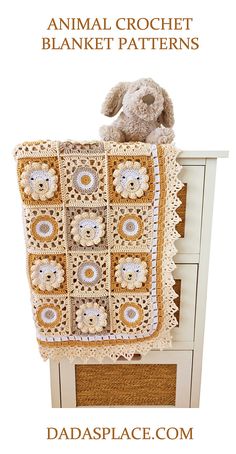 an animal crochet blanket is sitting on top of a dresser