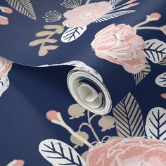 a blue floral wallpaper with pink flowers and leaves on the bottom half of it