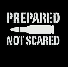 a black and white sign that says,'prepared not scared'with a knife