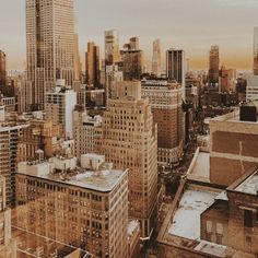 the city is full of tall buildings and snow covered rooftops, as well as skyscrapers