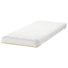 the mattress is white and has gold trim