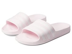 adidas Adilette Aqua Slides - Women's Shoes : Almost Pink/White/Almost Pink : The updated adidas Adilette Aqua Slides are a comfy and stylish addition to your day. Synthetic upper. Soft synthetic lining for comfort. Contoured footbed provides ultimate comfort. PU outsole for durability and traction. Please note, sizes listed refer to US sizing, but product shipped may be stamped with additional size conversions. Refer to shoe-box sizing for correct, US size. Imported. Measurements: Weight: 4 oz Adidas Logo Slides For Swimming In Spring, Adidas Sporty Flip Flops With Cushioned Footbed, Adidas Comfortable Flip Flops With Cushioned Footbed, Comfortable Adidas Cushioned Flip Flops, Comfortable Adidas Sports Sandals, Adidas Sporty Cushioned Flip Flops, Sporty Lightweight Synthetic Flip Flops, Adidas Logo Slides For Swimming, Sporty Lightweight Flip Flops For Sports