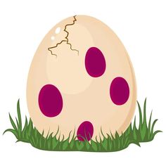 an egg sitting in the grass with polka dots on it's side and its shell broken