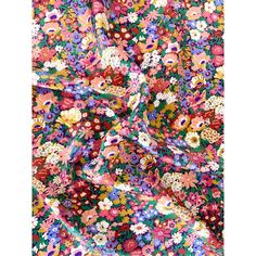 a colorful floral print fabric with lots of flowers on it