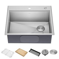 a stainless steel kitchen sink and accessories