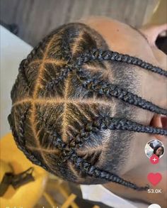 a person with braids on their hair