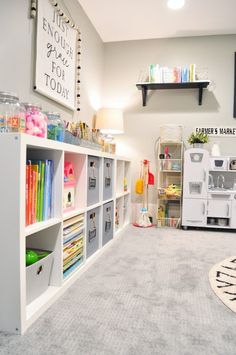 the children's playroom is clean and organized