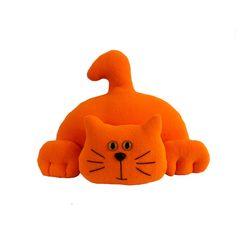 an orange cat toy laying on its side