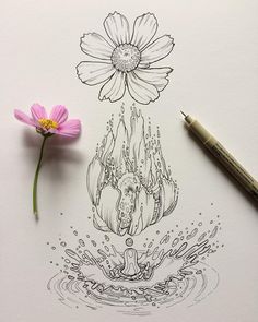 a flower sitting on top of a piece of paper next to a pencil and marker