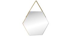 a mirror hanging on a wall with a gold frame and metal bar at the bottom