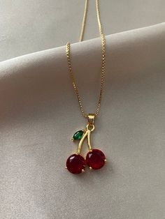 Dainty cherry pendant necklace -18k gold plated.  Non-tarnish and waterproof. Available with matching earrings (sold separately) Gold Cherry Necklace, Cherries Outfit, خواتم خطوبة, Cherry Necklace, Fancy Jewelry Necklace, Pretty Jewelry Necklaces, Jewelry Accessories Ideas, Classy Jewelry, Jewelry Lookbook