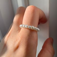 PLEASE READ: Make sure you take your ring of to wash your hand/swim etc to keep it in best possible condition  Size - ring comes in Small, Medium and large - - - -however it can be made in any UK ring size if you message me  Made - I make the earring to order  - handmade Colour - white Pearl  Customisation  - this product also comes in a bundle containing a matching pair of Pearl earrings  - if you have any requests message me  Shipping -Free Uk shipping Questions  - feel free to message me with White Open Ring Jewelry For Everyday, Minimalist Stackable Adjustable Pearl Ring, Adjustable Stackable Minimalist Pearl Ring, Adjustable Trendy Crystal Ring For Wedding, Elegant White Crystal Ring For Everyday, Elegant Everyday White Crystal Ring, White Pearl Stackable Jewelry, Adjustable Stackable Pearl Ring For Everyday, White Crystal Sterling Silver Dainty Ring