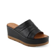 Spring Step-Allerton Wedge Sandal Step up your summer look with the Allerton wedge sandal from Spring Step. Classic wide band design with pleat detailing impart a unique touch to this leather platform slip-on. It is set atop a chunky bottom with wedge heel for added style. Summer Looks, Band Design, Black Wedge, Black Wedge Sandals, Summer Look, Wide Bands, Wedge Sandal, Wedge Heels, Step Up