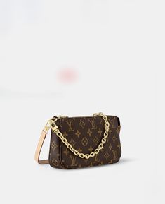 M82766 $1,520.00 One of Louis Vuitton's emblematic styles, the Pochette Accessoires in Monogram canvas is ideal for carrying everyday essentials. This chic pouch offers different looks and carry options thanks to its removable strap in natural leather and removable gold-tone chain. Its secure zip closure opens to reveal a spacious compartment with zipped and flat pockets and two card slots. Luis Vuitton Outfits, Lv Shoulder Bag, Pochette Louis Vuitton, Louis Vuitton Keychain, Lv Pochette, Louis Vuitton Clutch, Lv Purse, Louis Vuitton Purse, Lv Handbags