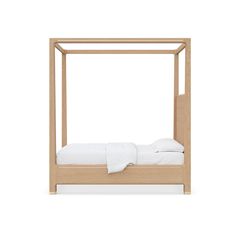 a bed with a wooden frame and white sheets on it's headboard, in front of a white background