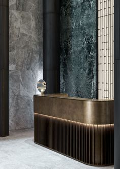 an elegant bathroom with marble walls and flooring