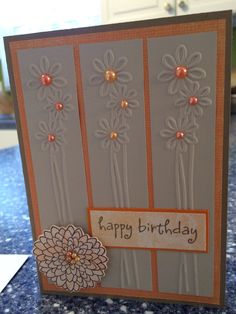 a handmade birthday card with flowers on it