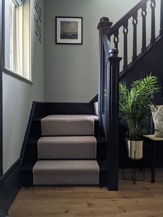 a set of stairs leading up to the second floor