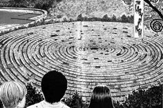 an image of two people looking at a maze