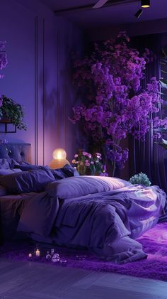 a bedroom with purple lighting and flowers on the bed