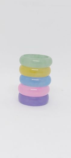 Jade Ring band Set for woman or man, Blue, Lavender, Yellow, Green, Pink Jade Ring Jewelry 5 Pieces Jade set or Single Ring. Chinese Jade Ring, Solid Stone Ring. 5mm Jade. Ring Size 7. Product Info: - Stone: Jade. - Jade Color: Blue / Lavender / Yellow/Green/Pink. - Jade size: 5mm. - Ring Size 7 - Jade Quantity: 5 - Nice Gift Box Included Luxury Polished Jade Rings, Good Fortune Jade Rings, Jade Rings, Jade Charm, Jade Color, Pink Jade, Edgy Jewelry, Golden South Sea Pearls, Green Stone Rings