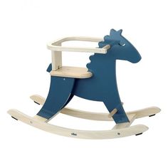 a wooden rocking horse with blue paint on it