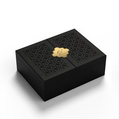 a black box with a gold emblem on it