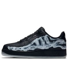 The Nike Air Force 1 07 Low Skeleton QS is the perfect shoe for Halloween. Dressed up in black leather with anatomical airbrushing for effect, this iteration of the iconic 1982 Nike hoops shoe glows in the dark, with its tarsal-bone graphics shining bright after the sun goes down. Bringing back the low-profile comfort of the original, it consists of supportive overlays, soft cushioning and durable rubber traction. Ideal for trick-or-treating, this shoe will make sure you stand out from the rest. (AF1/SNKR/Skate/Unisex/Low Top) Black Custom Sneakers With Translucent Outsole For Streetwear, Black Leather Custom Sneakers With Translucent Outsole, Leather Custom Sneakers With Air Cushioning For Streetwear, Nike Air Force 1 With Translucent Outsole For Streetwear, Nike Air Force 1 Leather For Streetwear, Urban Black Custom Sneakers With Translucent Outsole, Black Leather Custom Sneakers With Air Cushioning, Custom Fade-resistant Leather Sneakers For Streetwear, Black Nike Air Force 1 Fade-resistant For Streetwear