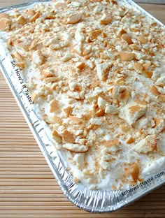 an uncooked dessert sitting on top of a wooden table