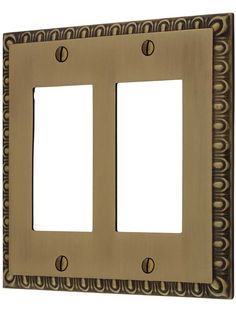 two light switch plates are shown with decorative designs on the front and back panels, both in antique brass