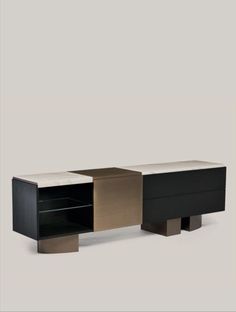 the sideboard has two different colors on it and is black, white, gold