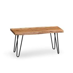 a wooden bench with black hairpinks on it's legs and a white background