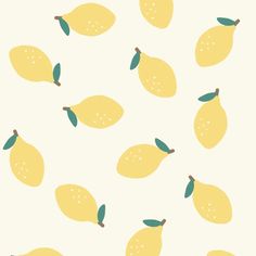 a bunch of lemons on a white background with green leaves in the shape of pears