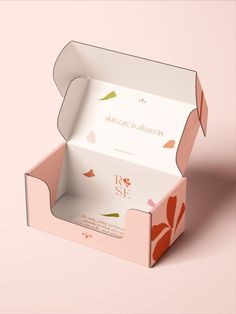 an open pink box on a pink background