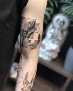 a person with a tattoo on their arm