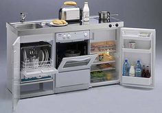 an open refrigerator with dishes and utensils in it