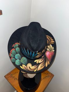 Florecita woven hand painted hat, one of a kind Hand Painted Hats Design, Painting On Hats, Custom Multicolor Hat With Curved Brim, Hand Painted Flat Brim Hat For Rodeo, Custom Hand Painted Wide Brim Hat, Custom Multicolor Wide Brim Hat, Black Handmade Artistic Hat, Black Hand-painted Hat With Curved Brim, Black Hand Painted Hat With Curved Brim