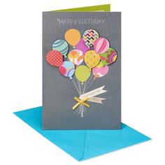 a birthday card with balloons on it