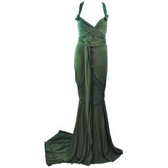 This Elizabeth Mason Couture gown is composed of bamboo jersey. Features a wrap style with a drop neckline. may be fashioned in a variety of colors. The gown may be fashioned in a variety of colors. This is a couture custom order. Please allow for a 60 day lead time from measurements, fabric selection, patterning, toile fitting, to final product. The dress shown is a sample size 2. The sample is not for purchase. Measurements of sample size: Length: 55" +10" Train Bust: 30" Waist: 26" Hip: 38" Blue Couture Gowns, Black Dinner Dress, Blue Velvet Gown, Blue Couture, Evening Gown Pattern, White Jersey Dress, Drape Gown, Drapey Dress, Jersey Evening Dress