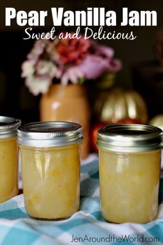 three jars filled with jam sitting on top of a blue and white checkered table cloth