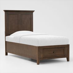 a bed with two drawers on each side