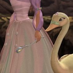 a woman in a pink dress standing next to a swan