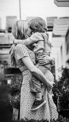 black and white photograph of two women hugging each other